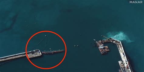 Satellite Images Show Russia Trying to Protect Warships From .